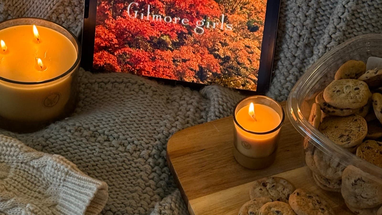 Person watching a video on a tablet with subtitles displayed on screen