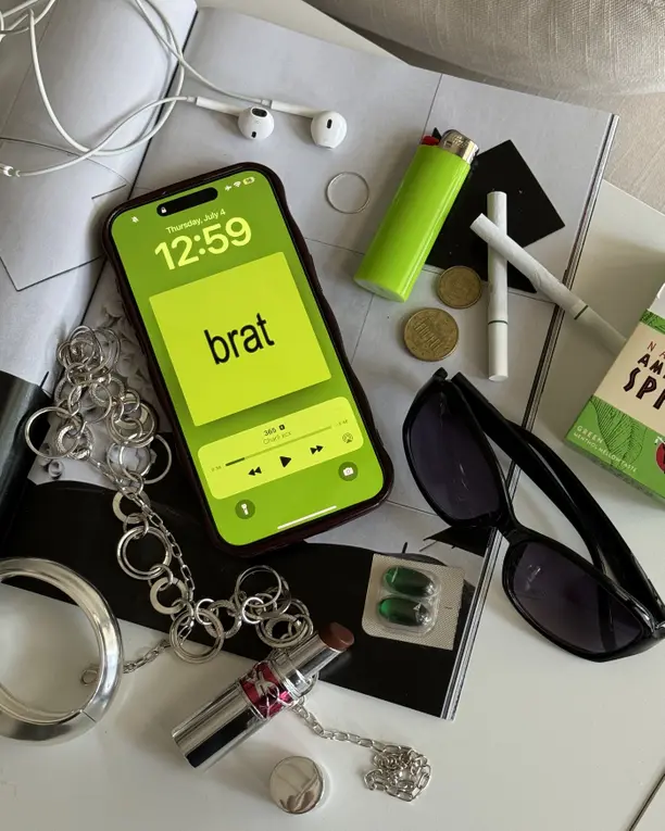 A smartphone showing a social media profile with growing follower count