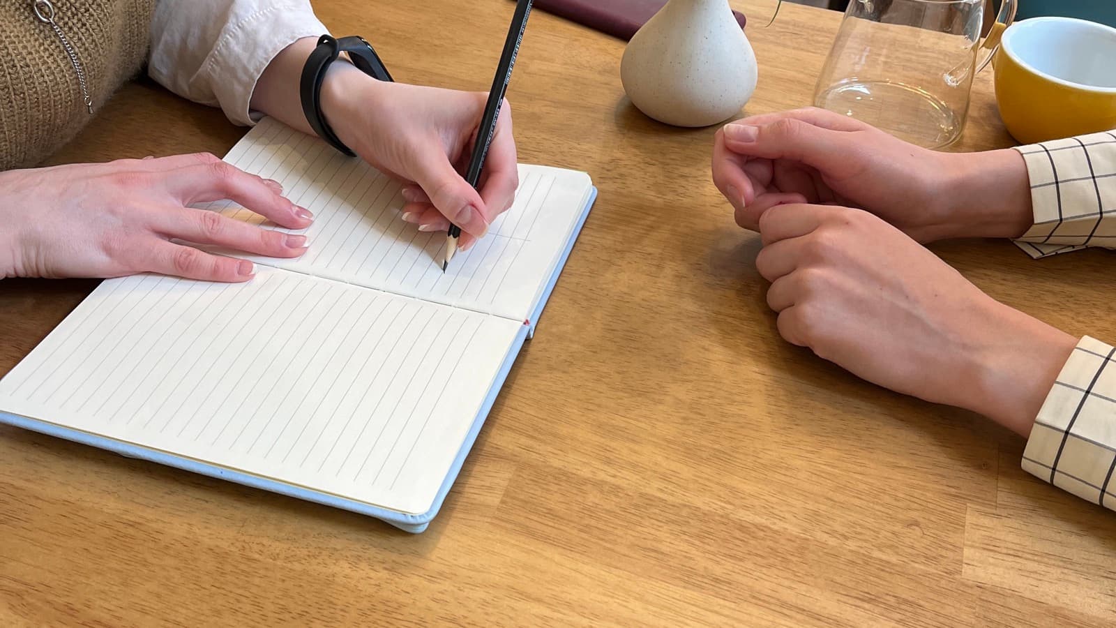A notebook and pen on a table, ready for writing a story